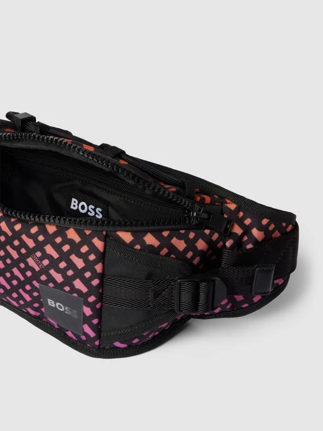 BOSS Bauchtasche Mit Allover-Logo Modell 'Bumbag' - BOSS X Khaby 2.0 - Dunkel Orange 7 BOSS Bauchtasche Mit Allover-Logo Modell 'Bumbag' - BOSS X Khaby 2.0 - Dunkel Orange – Bild 5