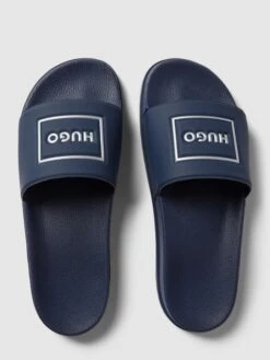 HUGO Slides Mit Label-Detail Modell 'Match' - Dunkelblau -Guesi Bekleidung Geschaft 758jieaaa984sh9oal0j4cqc8913gihk9d9kojaf9h2kgihl88p32c2b90okacqc6h442h9map93al1l993m6ohn65hm4d9mcgrj0e1k64pm8ohmchh66db4ccsmae1m6pim2p8