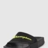 CHAMPION Slides Mit Label-Detail - Schwarz -Guesi Bekleidung Geschaft 8laj8iqb8934mchlad13icqd8oo42dq98co46d9n6d154gia9l6j2di78d6jilai655k2e2da8ol6i2g9ko3gob568s3gc1h6ks3cdpk69hj8e1m75h3gcpn6tj3geb3chh64dg