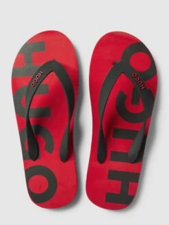 HUGO Zehentrenner Mit Logo-Print Modell 'Arvel' - Rot -Guesi Bekleidung Geschaft 8tb32h1k68p48kqcagqj4h1h9oo4ec2m6d3l6dij6d2kegqa6h254dadakrj0i2m95ak4e226t64ogam68o66opj64ojip1hccp62ohk6gr36e1i69hj6eb670q62e9oc4sjgd8