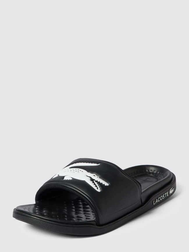 Lacoste Slides Mit Label-Applikation Modell 'Croco Dualiste' - Schwarz 4 Lacoste Slides Mit Label-Applikation Modell 'Croco Dualiste' - Schwarz – Bild 2