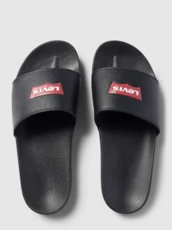 Levi’s® Acc. Slides Mit Label-Detail Modell 'JUNE BATWING' - Schwarz -Guesi Bekleidung Geschaft 94o44ki79133ijaba12jai2i8d7koc1ga1752gak990kqea2612ksdi7910k2ja29co4udpm7163gihi993jedj6ccqm8c9j6kpj4e1k60r3iohk6coj4ob26lgm6o9p68q38e0