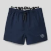 Jack & Jones Badehose Mit Label-Detail Modell 'FIJI' - Marineblau -Guesi Bekleidung Geschaft 94r30c1k84ok6hq8ap63gc2fa96ksl2j91746j2f6so5adqma59jggpjakq42j2eap6j4ja1a4pk6h2f8go6cdr174s64chhcgoj4cpkcdj66o9o74s62or26ks3ichi74q68o8