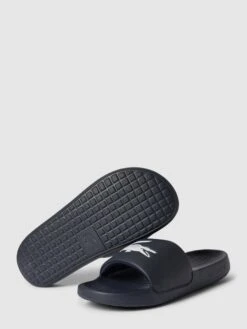 Lacoste Slides Mit Label-Details Modell 'Croco' - Dunkelblau -Guesi Bekleidung Geschaft ala46h9j8h646lhh6l848d2h8co32k1gacrk8cii9134mca28515alak8l93gjhp6123ikab89ajehqd9d3jeohp64s3cor3cor38p1k6dj6aoj56spj2ohl69i3edpk69hm8do